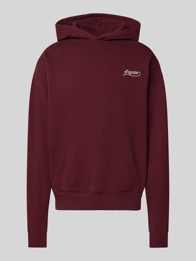 Produktfoto, Regular Fit Hoodie aus Baumwoll-Mix von PEGADOR in Dunkelrot mit Kängurutasche, Strass-Logo und gerippten Abschlüssen