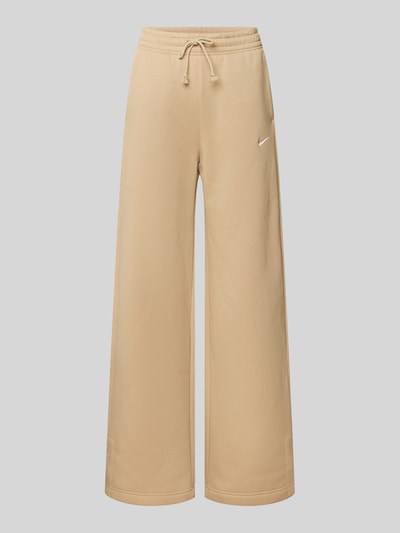Produktfoto, Wide Leg Sweatpants mit Logo Modell 'Phoenix' von Nike aus Baumwoll-Mix in Beige, elastischer Bund mit Tunnelzug, Innenbeinlänge 78 cm, Damen.