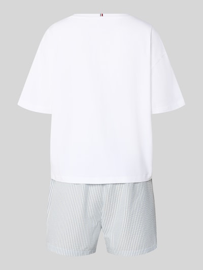 Frauenmodel trägt Pyjama aus Baumwoll-Mix mit Logo-Stitching von TOMMY HILFIGER, mehrfarbig, Regular-Fit, Jersey, Seersucker, Ganzkörperansicht Rückansicht.