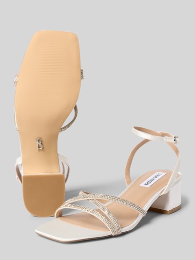 Produktfoto, Damen Sandaletten mit eckiger Form, Riemchen und Dornschließe, Strasssteinbesatz, Blockabsatz, glatte Sohle, Absatzhöhe: 5 cm, Modell 'Gabby' von Steve Madden, Größe 40, cremefarben, glänzende Textur
