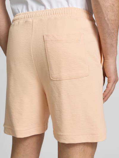Lacoste Regular Fit Sweatshorts aus reiner Baumwolle Lachs 3