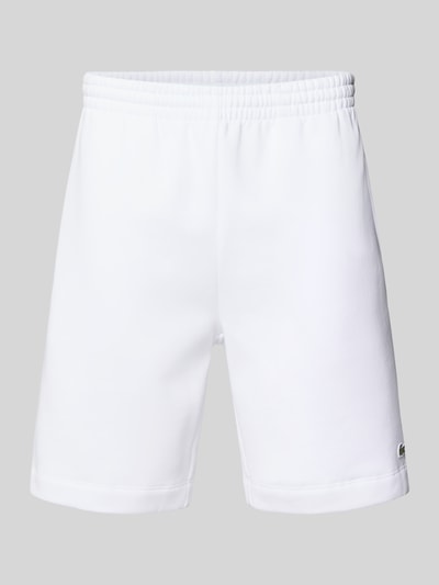 Produktfoto, Regular Fit Sweatshorts aus Baumwoll-Mix von Lacoste, efekt: jednolity kolor, krój regular fit, naszywka z logo, ściągacz, tunel z regulacją szerokości, wpuszczane kieszenie boczne, kieszeń z tyłu, wykończenie materiału: dzianina dresowa, mieszanka bawełny