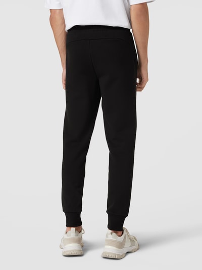 PUMA PERFORMANCE Sweatpants met labelprint Zwart - 5