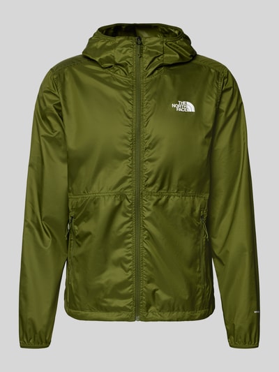 Productfoto, Windbreaker mit Logo und ritszakken van The North Face in olijfgroen, regular fit, capuchon, gladde textuur, maat M.