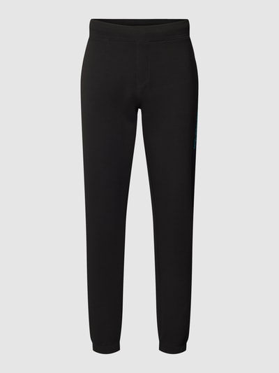 CK Calvin Klein Spodnie dresowe o kroju comfort fit w jednolitym kolorze Czarny 2