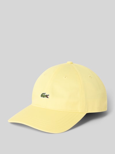 Produktfoto, Basecap aus reiner Baumwolle von Lacoste in Hellgelb mit feiner Webstruktur, Label Patch und Logo-Prägung, unifarbene Optik