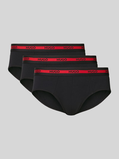Produktfoto, Slip mit elastischem Logo-Bund im 3er-Pack von HUGO, schwarzer Baumwoll-Mix mit Stretch-Anteil, eng anliegender Schnitt, Unifarbenes-Design, roter Elastischer-Logo-Bund