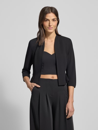 Frauenmodel trägt Bolero mit 3/4-Ärmel von Swing in Schwarz, Material-Mix mit Stretch-Anteil, Regular Fit, Nahaufnahme Oberkörper.
