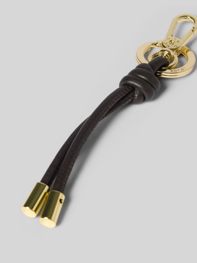 Productfoto, hanger met knoopdetail van Abro, goudkleurige karabijnhaak, label in reliëf, damesaccessoire, gladde textuur, zwart en goud