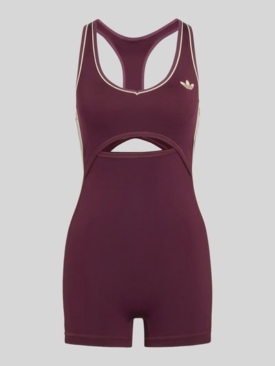 Produktfoto, Slim Fit Sport-Jumpsuit mit Kontraststreifen von adidas in Dunkellila mit cremefarbenen Linien, Damen Sport-Jumpsuit von adidas Training