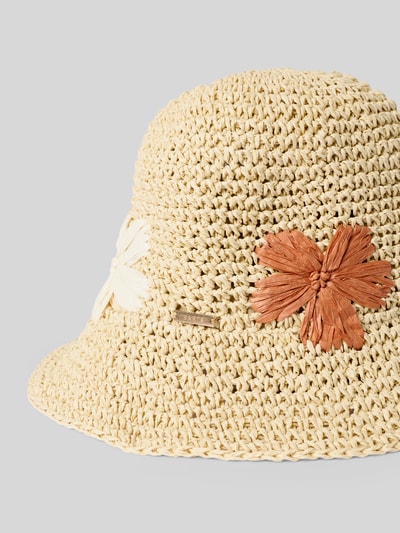 Produktfoto, Hut mit floralen Applikationen Modell 'DARSHY' von Barts aus Reinem Papier mit Label-Detail, grobe Flechtstruktur, helle Naturtöne.