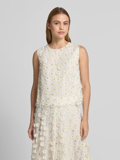 Frauenmodel trägt Blusentop im Allover-Look mit Rundhalsausschnitt von Luisa Cerano aus Tüll, Regular-Fit, Rückenlänge 86 cm, Nahaufnahme Oberkörper.