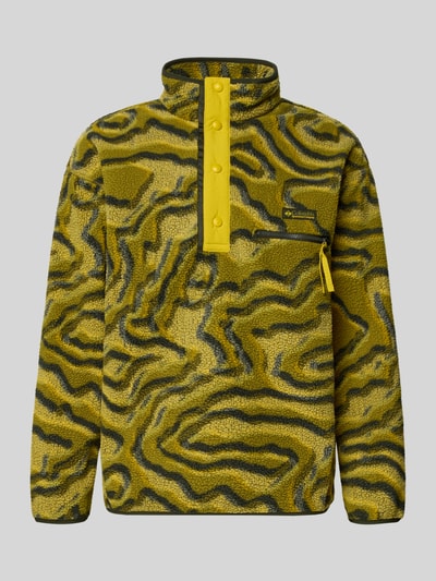 Produktfoto, Regular Fit Pullover mit Logo-Patch von Columbia in gelber Fließ-Optik mit abstraktem Muster, Brusttasche mit Reißverschluss, Stehkragen mit Druckknopfleiste, elastische Abschlüsse, Herren, Rückenlänge 72 cm, Ärmellänge 49 cm