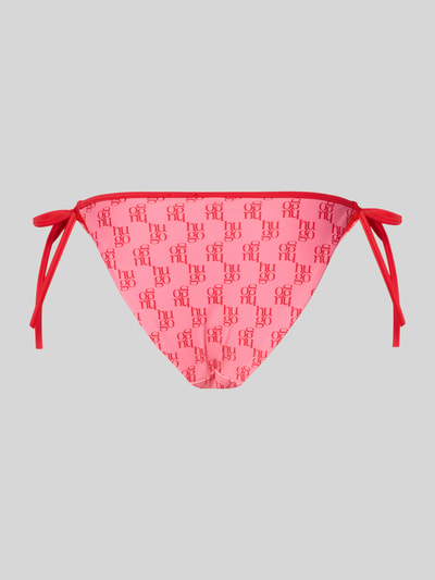 Produktfoto, Bikini-Slip mit Logo-Allover-Muster Modell 'MONOGRAM SIDE TIE' von HUGO, Optik:Allover-Muster, Logo-Monogramm, Verschluss: Bindebänder seitlich, Materialverarbeitung: Stretch, pinkes und rotes Design, glatte Textur