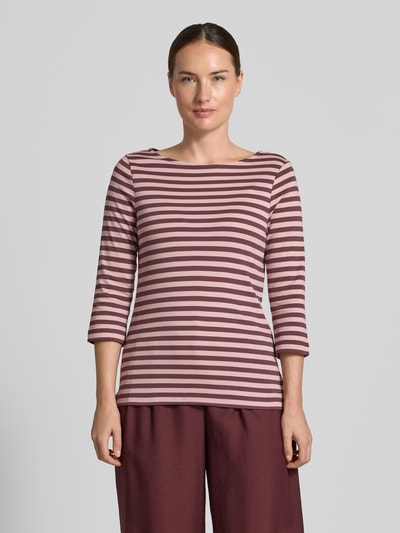 Frauenmodel trägt Longsleeve mit 3/4-Arm von Christian Berg Woman, reine Baumwolle, gerade geschnitten, gestreift, Nahaufnahme Oberkörper.