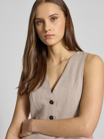 Kobiece modelka nosi Regular Fit Kamizelka z jednorzędową listwą guzikową Model 'LINDA' od ONLY, melanżowy efekt, dekolt w serek, imitacja kieszeni, zbliżenie górnej części ciała