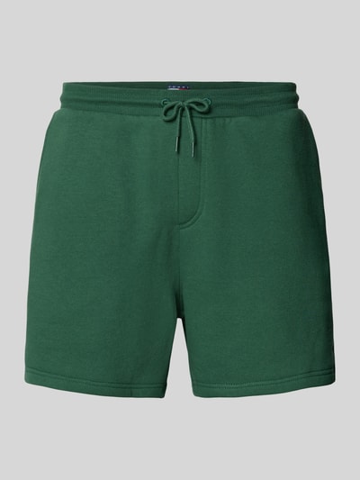 Produktfoto, Regular Fit Shorts aus Baumwoll-Mix von Tommy Jeans, efekt: jednolity kolor, krój regular fit, detal z logo, tunel, elastyczny ściągacz, kieszeń z tyłu, wpuszczane kieszenie, wykończenie materiału: dzianina dresowa, mieszanka bawełny
