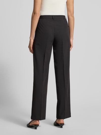 Frauenmodel trägt Slim Fit Longblazer mit Viskose-Anteil Modell 'FRIDA' von Vero Moda in Unifarben-Melange, Webware, Ganzkörperansicht Rückansicht.