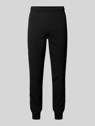 Lacoste Loose Fit Sweatpants aus reiner Baumwolle Modell 'TAPE' Black 1