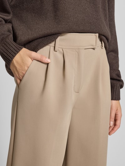 Review Spodnie materiałowe z szeroką nogawką i zakładkami w pasie Piaskowy 3