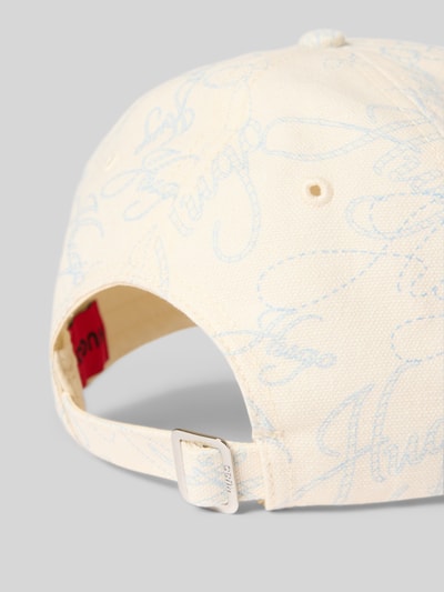 Produktfoto, Basecap aus reiner Baumwolle Modell 'ALLY' von HUGO, Optik:Allover-Muster mit Label-Schriftzug, verstellbarer Riegel, Materialverarbeitung: Twill