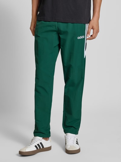 adidas Originals Spodnie dresowe z elastycznym ściągaczem Ciemnozielony 4