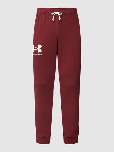 Under Armour Spodnie dresowe z nadrukiem z logo Oberżynowy 2