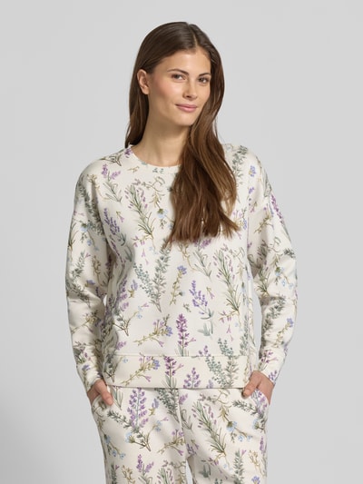 Vrouwenmodel draagt Sweatshirt O-Neck met Lavendelprint van Christian Berg Woman, mix van viscose en elastaan, los model, elastische boorden, lavendelprint. Ganzkörperansicht von vorne.