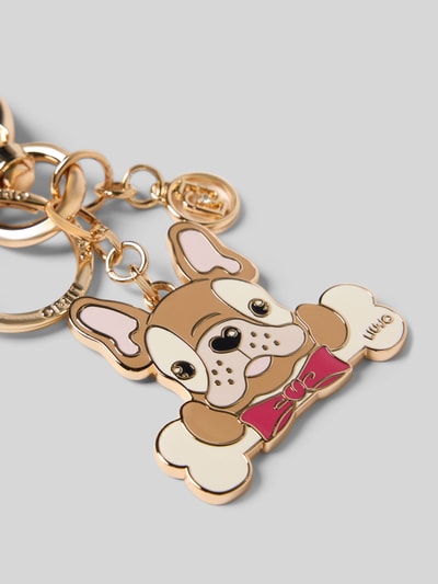 Produktfoto, brelok do kluczy z motywem psa, model 'DOG KEY RING' od Liu Jo White, kółko do kluczy, karabińczyk, aplikacja z metką, złote i kremowe odcienie, gładkie powierzchnie, detale z logo marki