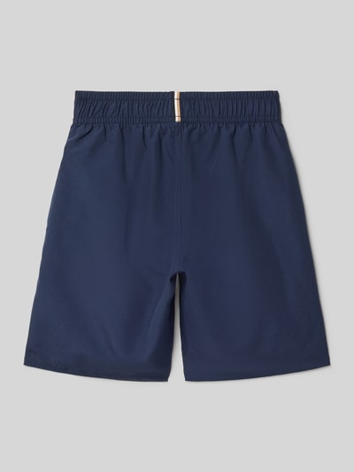 Productfoto, Badeshorts met labelopschrift van Boss voor kinderen, look: effen kleuren, elastische boord, zij-steekzakken, tunnelkoordsluiting