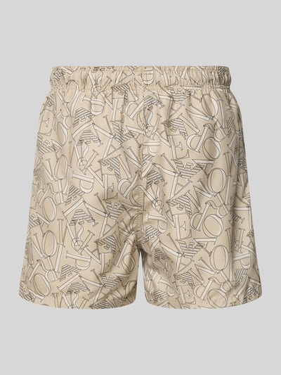 Produktfoto, Regular Fit Shorts mit Allover-Logo-Print von Emporio Armani in Beige mit elastischem Bund und Tunnelzug, grafisches Muster