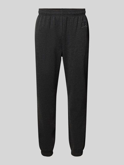 Produktfoto, Sweatpants mit Logo und elastischem Bund von GAP aus mieszanka bawełny, krój regular fit, długość wewnętrzna nogawki 78 cm, kolor ciemnoszary, gładka faktura