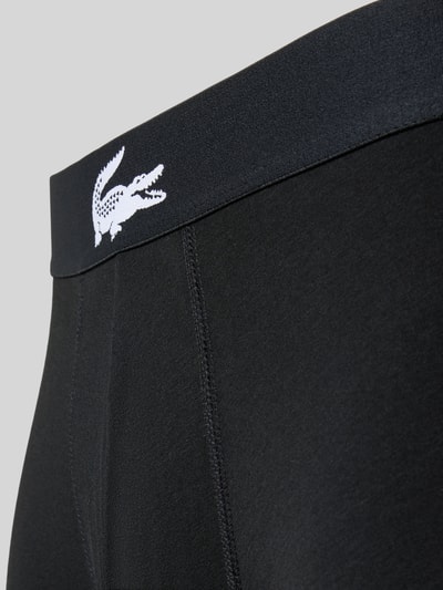 Produktfoto, Pant & Trunk aus Baumwoll-Mix im 3er-Pack von Lacoste für Herren in Schwarz mit weißem Logo auf glatter Textur