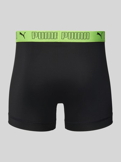 Produktfoto, Slim Fit Trunk mit Logo-Stitching von PUMA in Schwarz mit grünem Elastischer-Logo-Bund, Elastischer-Material-Mix, Herren