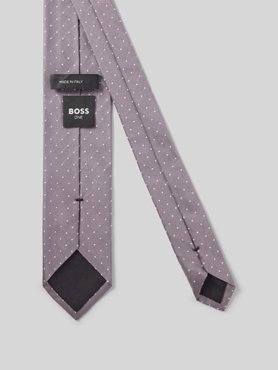 Productfoto, Seidenkrawatte mit all-over motief van BOSS in lichtpaars met gestippeld patroon, gemaakt van zuiver zijde, gladde textuur.