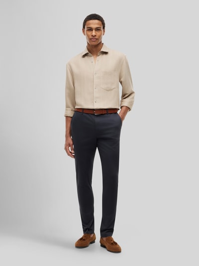 Tommy Hilfiger Chinos o kroju slim fit z mieszanki bawełny model 'BLEECKER' Granatowy 1