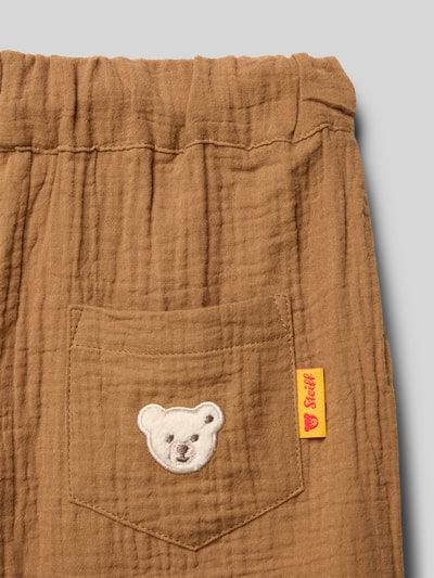 Productfoto, Regular Fit Shorts mit Logo-Detail van Steiff voor dames, puur katoen, structuurpatroon, achterzak, elastische band met tunnelkoord, maat 116 bandwijdte 31 cm, binnenbeenlengte 11 cm