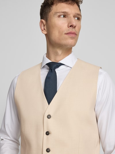 Männermodel trägt Slim Fit Anzugweste mit Woll-Anteil Modell 'NEIL' von SELECTED HOMME, Optik: Unifarben, Nahaufnahme Oberkörper.