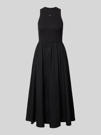 Produktfoto, Midikleid aus reiner Baumwolle von Tommy Jeans in Schwarz, ärmellos, A-Linie, unifarbene Struktur, Rundhalsausschnitt, Midi-Länge.