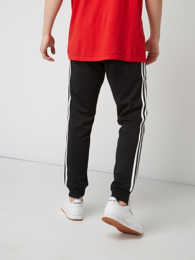 adidas Originals Spodnie dresowe z paskami z logo Czarny 5