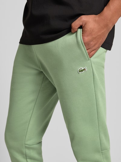Lacoste Spodnie dresowe o kroju slim fit z mieszanki bawełny Zielony 3