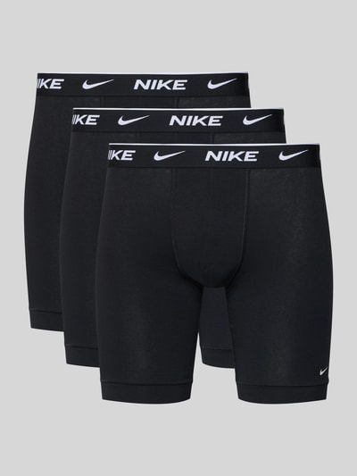 Produktfoto, schwarze Herren Trunks mit elastischem Logo-Bund, Modell 'E-DAY' von Nike, eng anliegende Passform, feine Struktur