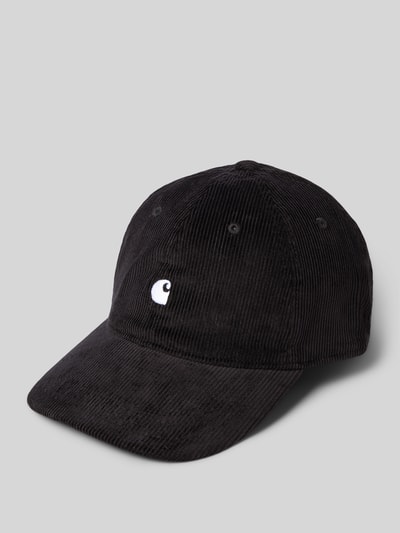 Produktfoto, Basecap mit Label-Stitching von Carhartt Work In Progress aus reiner Baumwolle, verstärkter Schirm, eingestickte Luftlöcher, verstellbarer Verschluss, schwarze Farbe, strukturierte Cord-Textur, gebogene Form.