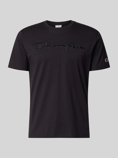 Produktfoto, T-Shirt mit Label-Stitching mit Rundhalsausschnitt von CHAMPION, schwarze Reine Baumwolle, Regular-Fit, Rückenlänge 68 cm bei Größe M.