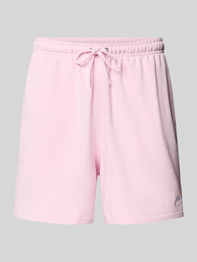 Produktfoto, Shorts mit Label-Stitching und elastischem Bund von Nike in Rosa aus Baumwoll-Mix, Relaxed-Fit, Tunnelzug, glatte Textur.