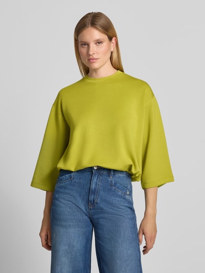 Vrouwenmodel draagt Dames sweatshirt van JOOP!, Materiaalmix met modal, regular fit, model 'Tahani' met tunnelkoord, ronde hals, 3/4-mouw, voorkant bovenlichaam close-up