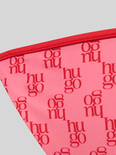 Produktfoto, Bikini-Slip mit Logo-Allover-Muster Modell 'MONOGRAM SIDE TIE' von HUGO in Pink mit rotem Logo-Monogramm, Stretch Materialverarbeitung