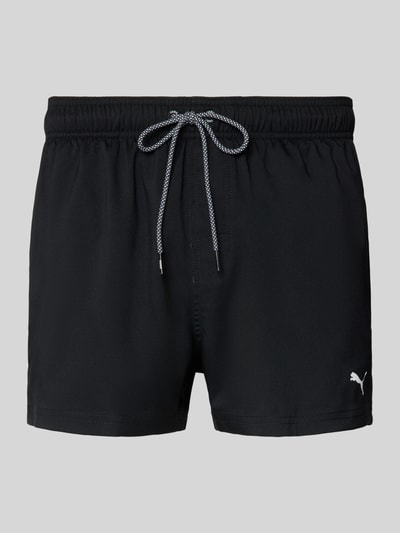 Produktfoto, Badehose mit Seitentaschen und Klettverschlusstasche hinten von PUMA in Schwarz, elastischer Bund, Regular Fit, glatte Textur
