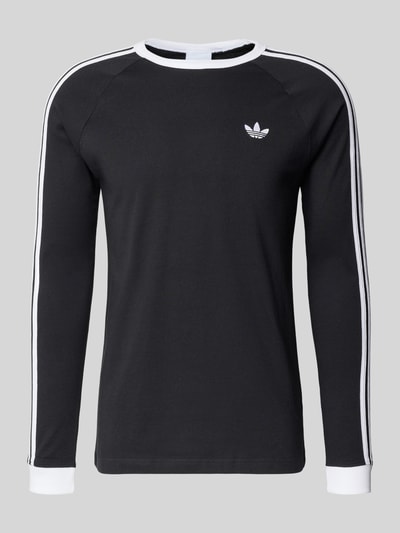 Produktfoto, Longsleeve mit gerippten Abschlüssen von adidas Originals in Schwarz mit weißen Streifen, Reine Baumwolle, Regular-Fit, Rundhalsausschnitt, Label-Stitching, Rückenlänge Größe M 71 cm