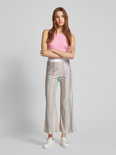 Marc Cain Flared stoffen broek met all-over motief Neon groen - 1